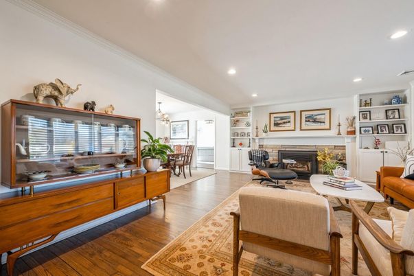 Dining room, Fireplace, Interior, Living room, Pendant Lights, Recessed Lighting, Wood Texture Flooring