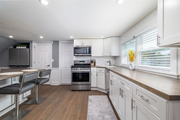 Interior, Kitchen, Recessed Lighting, Stainless Steel Appliances, Wood Texture Flooring