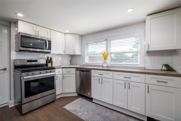 Interior, Kitchen, Recessed Lighting, Stainless Steel Appliances, Wood Texture Flooring