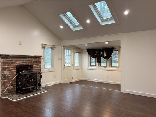 Fireplace, Interior, Recessed Lighting, Stone Walls, Wood Texture Flooring