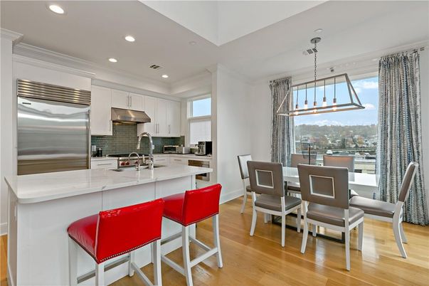 Dining room, Interior, Kitchen, Pendant Lights, Recessed Lighting, Stainless Steel Appliances, Wood Texture Flooring