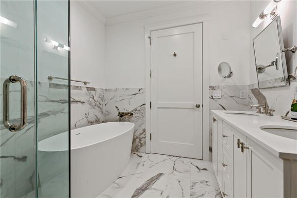 Bathroom, Dual Sink Vanities, Free Standing Baths, Glass Shower, Interior, Marble, Marble Walls