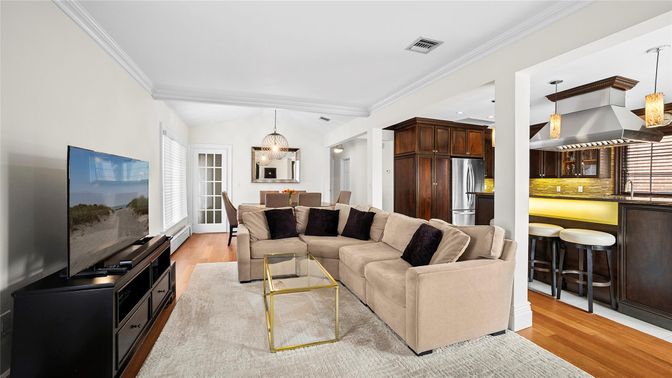 Dining room, Interior, Kitchen, Living room, Pendant Lights, Recessed Lighting, Stainless Steel Appliances, Wood Texture Flooring