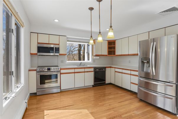 Interior, Kitchen, Pendant Lights, Recessed Lighting, Stainless Steel Appliances, Wood Texture Flooring