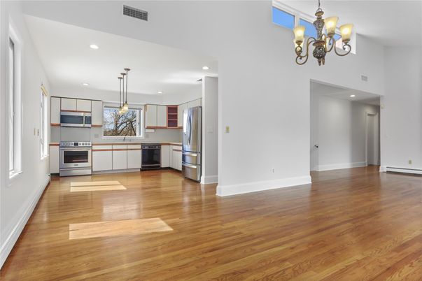 Chandelier, Interior, Kitchen, Pendant Lights, Recessed Lighting, Stainless Steel Appliances, Wood Texture Flooring