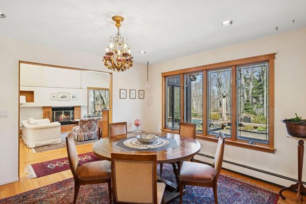 Chandelier, Dining room, Fireplace, Interior, Living room, Recessed Lighting, Wood Texture Flooring