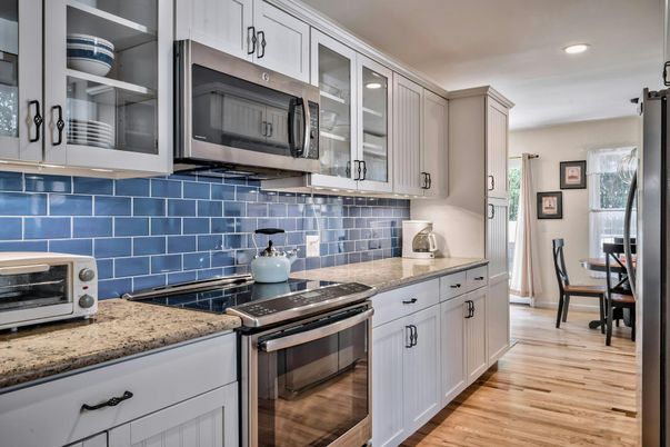 Dining room, Interior, Kitchen, Recessed Lighting, Stainless Steel Appliances, Wood Texture Flooring