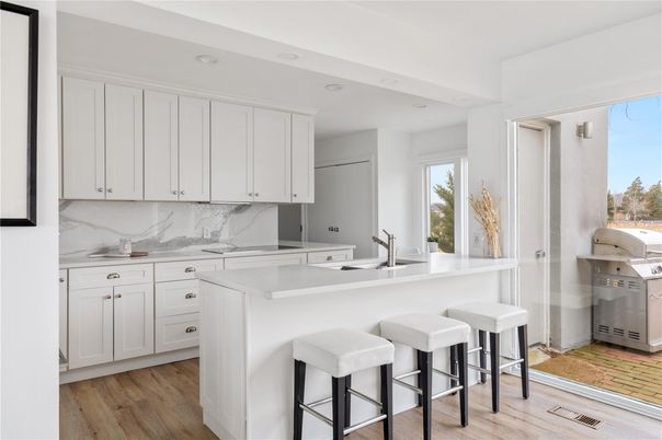 Interior, Kitchen, Marble Walls, Recessed Lighting, Wood Texture Flooring