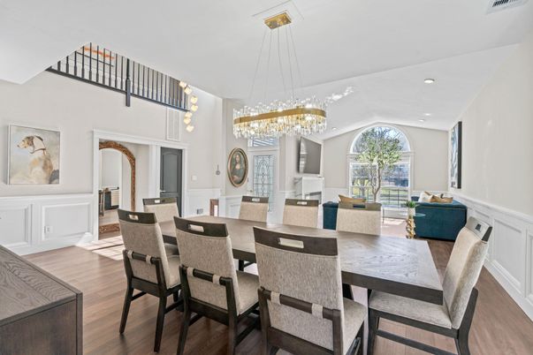 Chandelier, Dining room, Fireplace, Interior, Living room, Pendant Lights, Recessed Lighting, Wood Texture Flooring