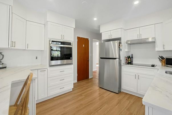 Interior, Kitchen, Recessed Lighting, Stainless Steel Appliances, Wood Texture Flooring