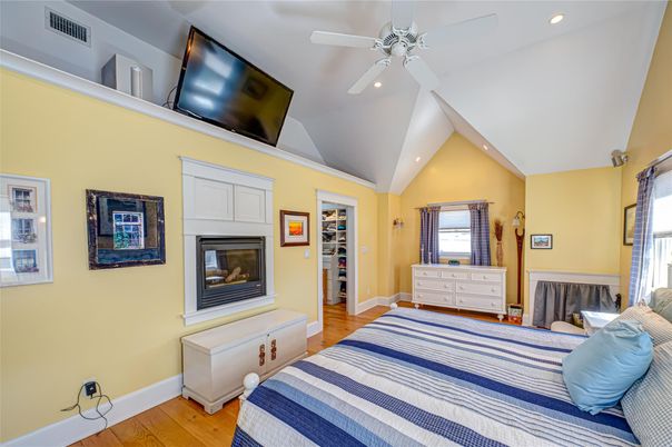 Bedroom, Fireplace, Interior, Recessed Lighting, Wood Texture Flooring