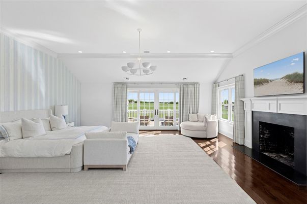 Bedroom, Fireplace, Interior, Living room, Pendant Lights, Recessed Lighting, Wood Texture Flooring