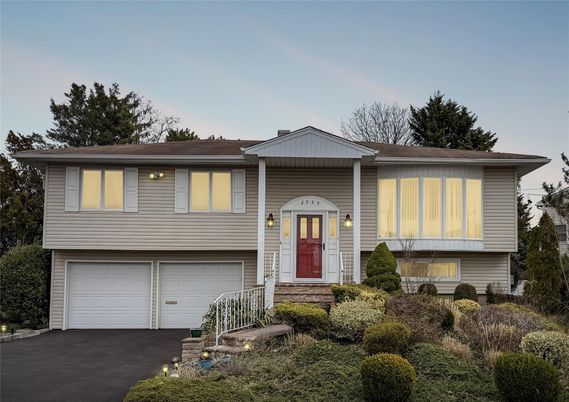 Attached, Exterior, Facade, Raised Ranch