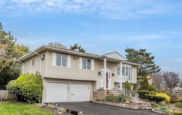 Attached, Exterior, Facade, Raised Ranch