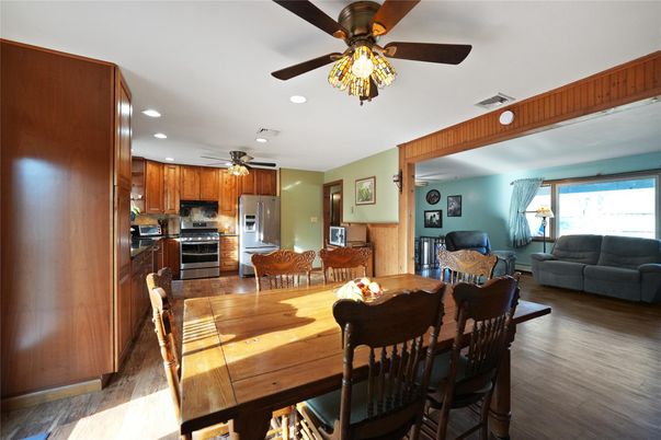 Dining room, Interior, Kitchen, Living room, Recessed Lighting, Stainless Steel Appliances, Wood Texture Flooring
