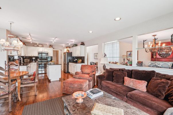 Chandelier, Dining room, Interior, Kitchen, Living room, Recessed Lighting, Stainless Steel Appliances, Wood Texture Flooring