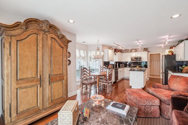 Chandelier, Dining room, Interior, Kitchen, Living room, Recessed Lighting, Stainless Steel Appliances, Wood Texture Flooring