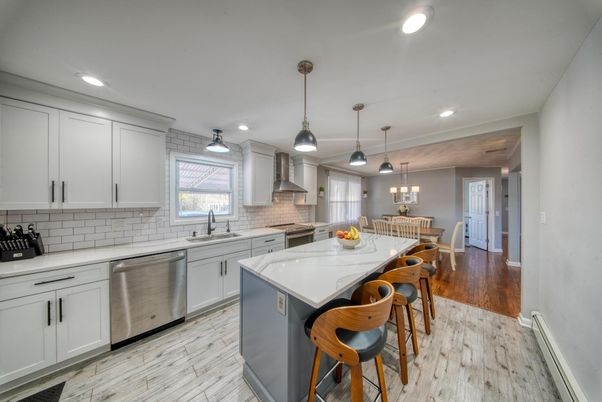 Dining room, Interior, Kitchen, Pendant Lights, Recessed Lighting, Stainless Steel Appliances, Wood Texture Flooring