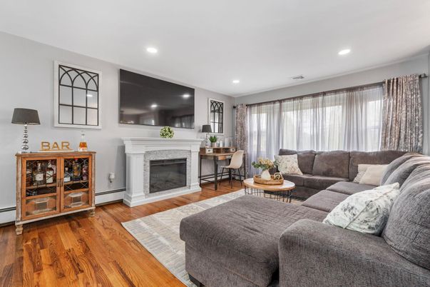 Fireplace, Interior, Living room, Recessed Lighting, Wood Texture Flooring