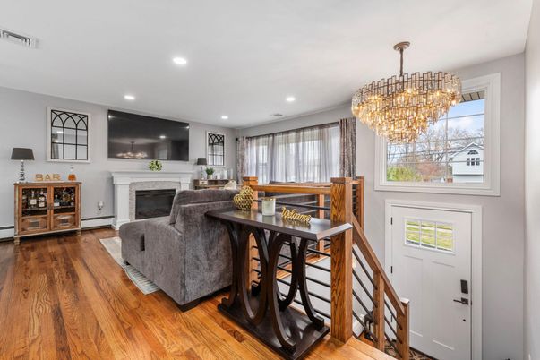 Chandelier, Dining room, Fireplace, Interior, Living room, Recessed Lighting, Wood Texture Flooring