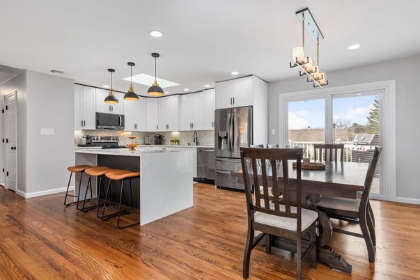 Dining room, Interior, Kitchen, Pendant Lights, Recessed Lighting, Stainless Steel Appliances, Wood Texture Flooring