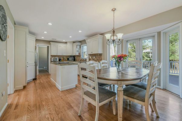 Chandelier, Dining room, Interior, Kitchen, Recessed Lighting, Stainless Steel Appliances, Wood Texture Flooring