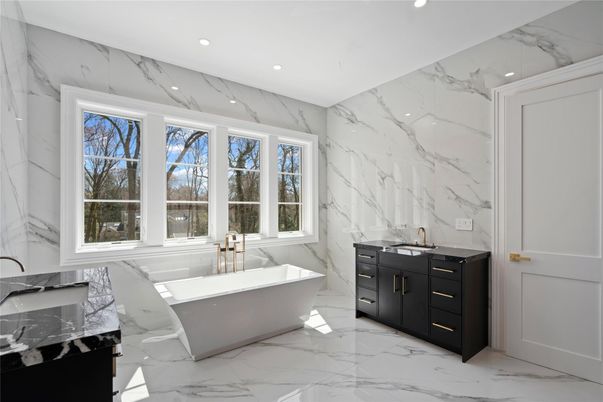 Bathroom, Dual Sink Vanities, Free Standing Baths, Interior, Marble, Marble Walls, Recessed Lighting
