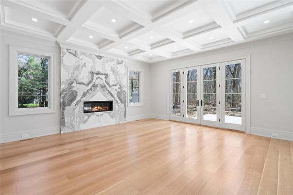 Empty room, Fireplace, Interior, Marble Walls, Recessed Lighting, Wood Texture Flooring