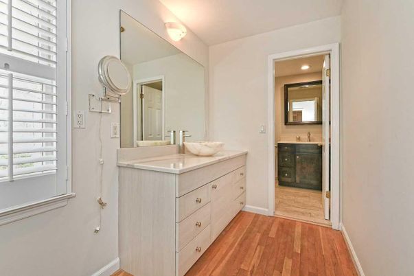 Bathroom, Dual Sink Vanities, Interior, Recessed Lighting, Wood Texture Flooring
