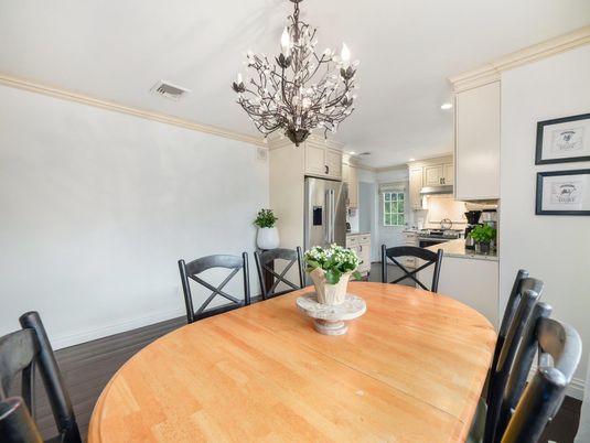 Chandelier, Dining room, Interior, Kitchen, Recessed Lighting, Stainless Steel Appliances, Wood Texture Flooring