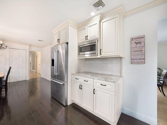 Chandelier, Interior, Kitchen, Recessed Lighting, Stainless Steel Appliances, Wood Texture Flooring