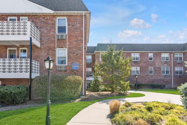 Exterior, Facade, Brick Facade, Condo Building