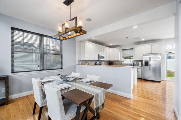 Dining room, Interior, Kitchen, Pendant Lights, Recessed Lighting, Stainless Steel Appliances, Wood Texture Flooring