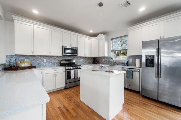 Interior, Kitchen, Pendant Lights, Recessed Lighting, Stainless Steel Appliances, Wood Texture Flooring