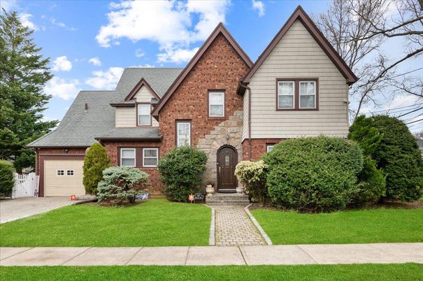 Attached, Exterior, Facade, Brick Facade, Tudor Revival