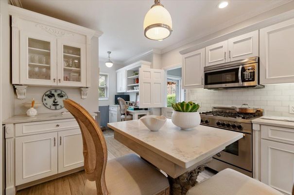 Dining room, Interior, Kitchen, Pendant Lights, Recessed Lighting, Stainless Steel Appliances, Wood Texture Flooring