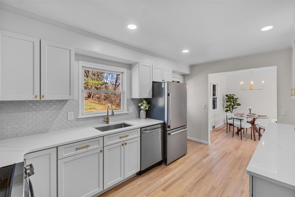Dining room, Interior, Kitchen, Pendant Lights, Recessed Lighting, Stainless Steel Appliances, Wood Texture Flooring