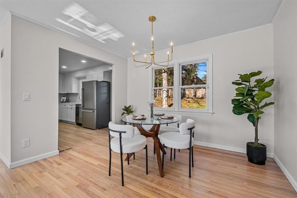 Chandelier, Dining room, Interior, Kitchen, Pendant Lights, Recessed Lighting, Stainless Steel Appliances, Wood Texture Flooring