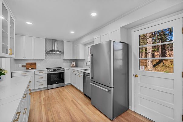 Interior, Kitchen, Recessed Lighting, Stainless Steel Appliances, Wood Texture Flooring