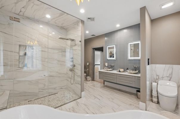 Bathroom, Dual Sink Vanities, Glass Shower, Interior, Marble, Marble Walls, Recessed Lighting