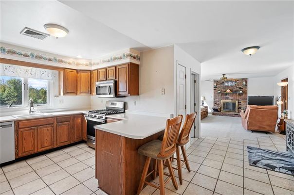 Fireplace, Interior, Kitchen, Living room, Stainless Steel Appliances, Stone Walls