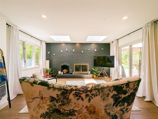 Fireplace, Interior, Living room, Recessed Lighting, Stone Walls, Wood Texture Flooring