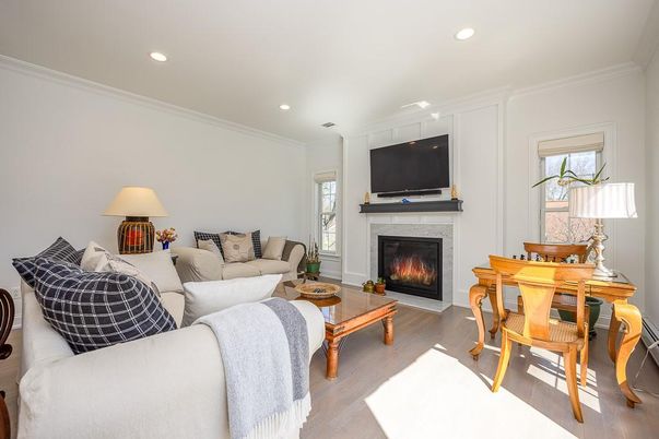 Dining room, Fireplace, Interior, Living room, Recessed Lighting, Wood Texture Flooring