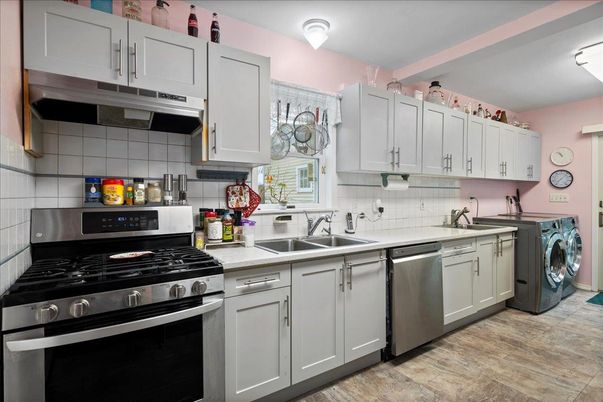 Interior, Kitchen, Stainless Steel Appliances, Washer, Wood Texture Flooring