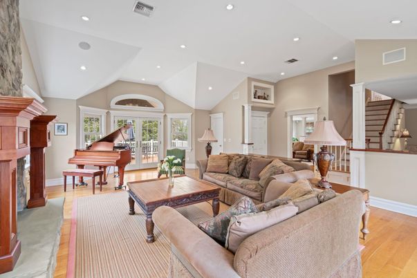 Fireplace, Interior, Living room, Piano, Recessed Lighting, Wood Texture Flooring