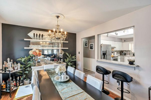 Chandelier, Dining room, Interior, Kitchen, Stainless Steel Appliances, Wood Texture Flooring