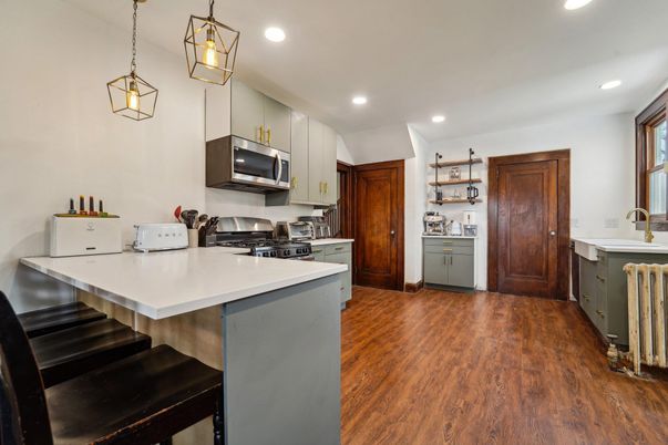 Interior, Kitchen, Pendant Lights, Recessed Lighting, Stainless Steel Appliances, Wood Texture Flooring