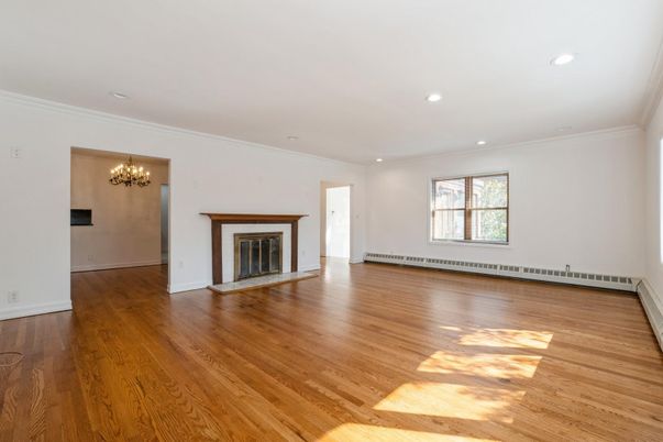Chandelier, Empty room, Fireplace, Interior, Recessed Lighting, Wood Texture Flooring