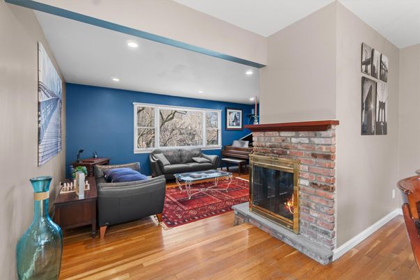 Fireplace, Interior, Living room, Piano, Recessed Lighting, Wood Texture Flooring
