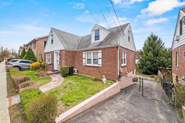 Exterior, Facade, Brick Facade, Cape Cod